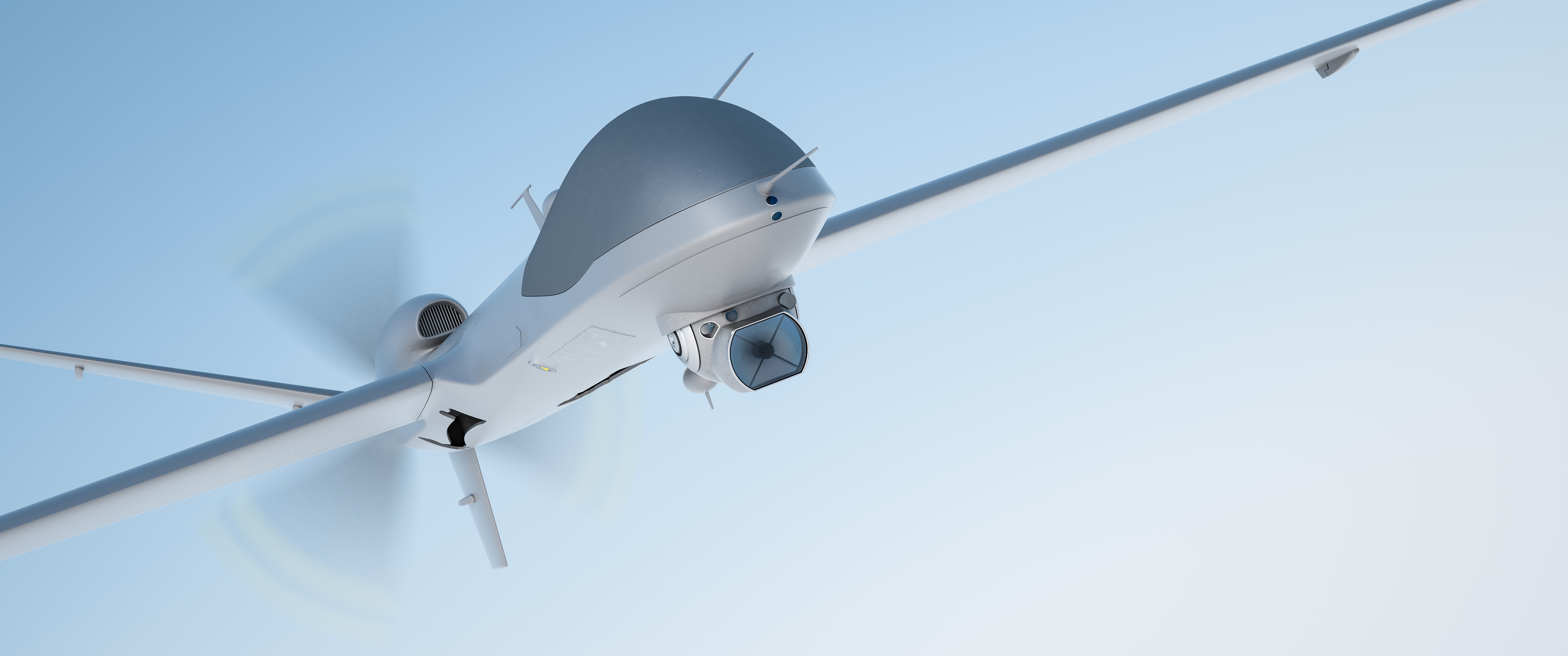 Image of a drone against blue sky