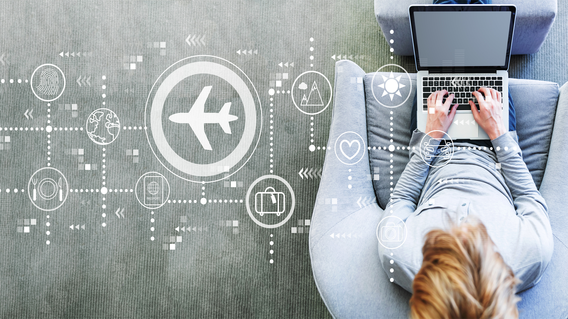 person on couch with laptop with airplane icon to the left