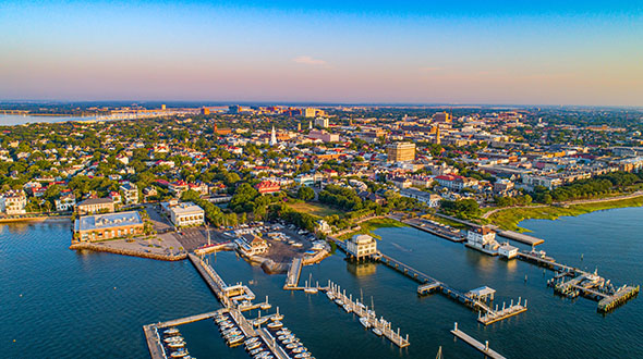 drone view of a city and a marina